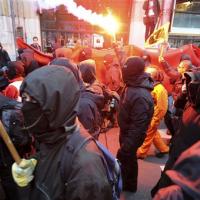 masked_squatters_demonstrate_in_the_centre_of_amst